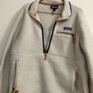 Patagonia pull over, a mixture between tan and cream.